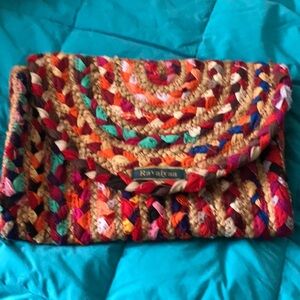 An American heirloom country style rug?? No! It’s a clutch purse!